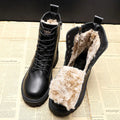Delphine – Schwarze Winterstiefel